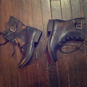Black buckled boots
